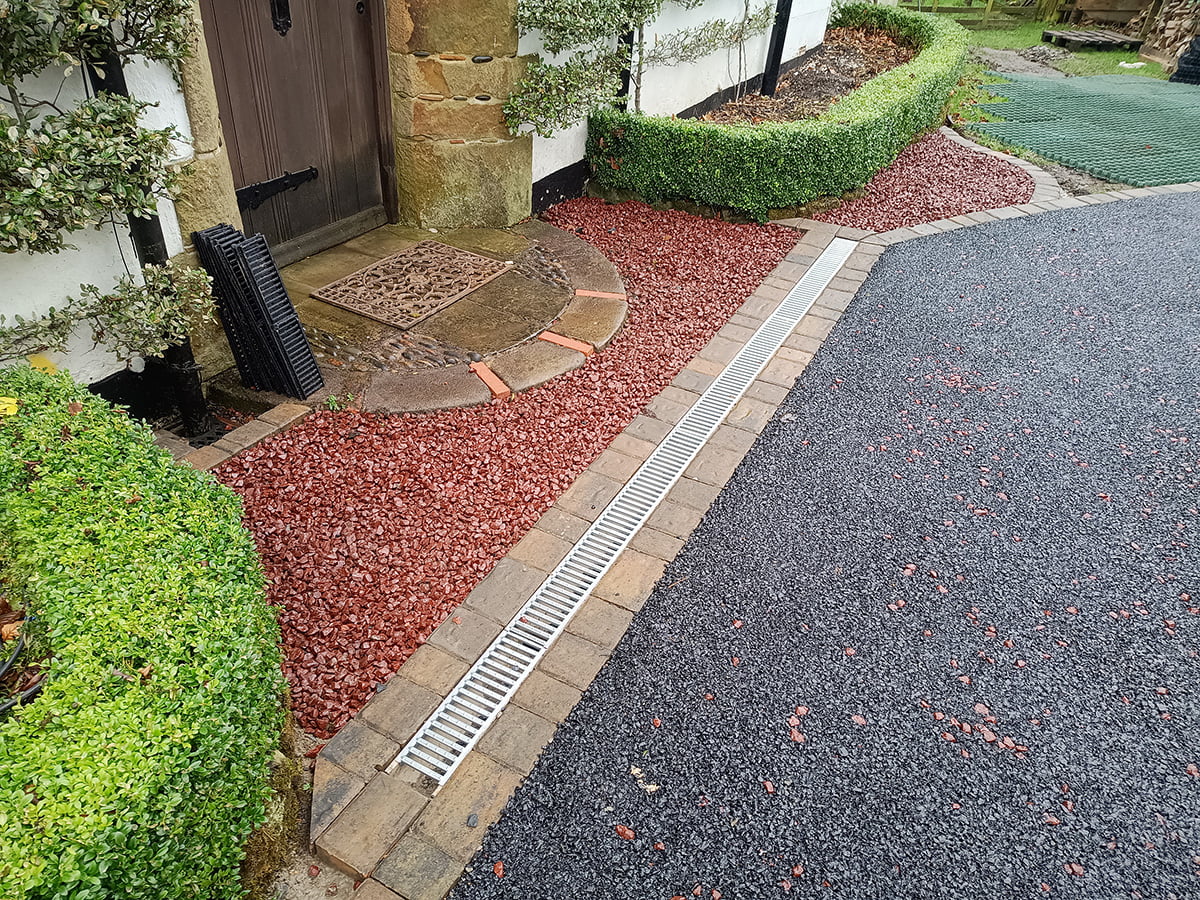 Enhance curb appeal with a durable and visually appealing tarmac driveway from W Miller & Sons, serving Lesbury, Alnwick, Amble, and Morpeth