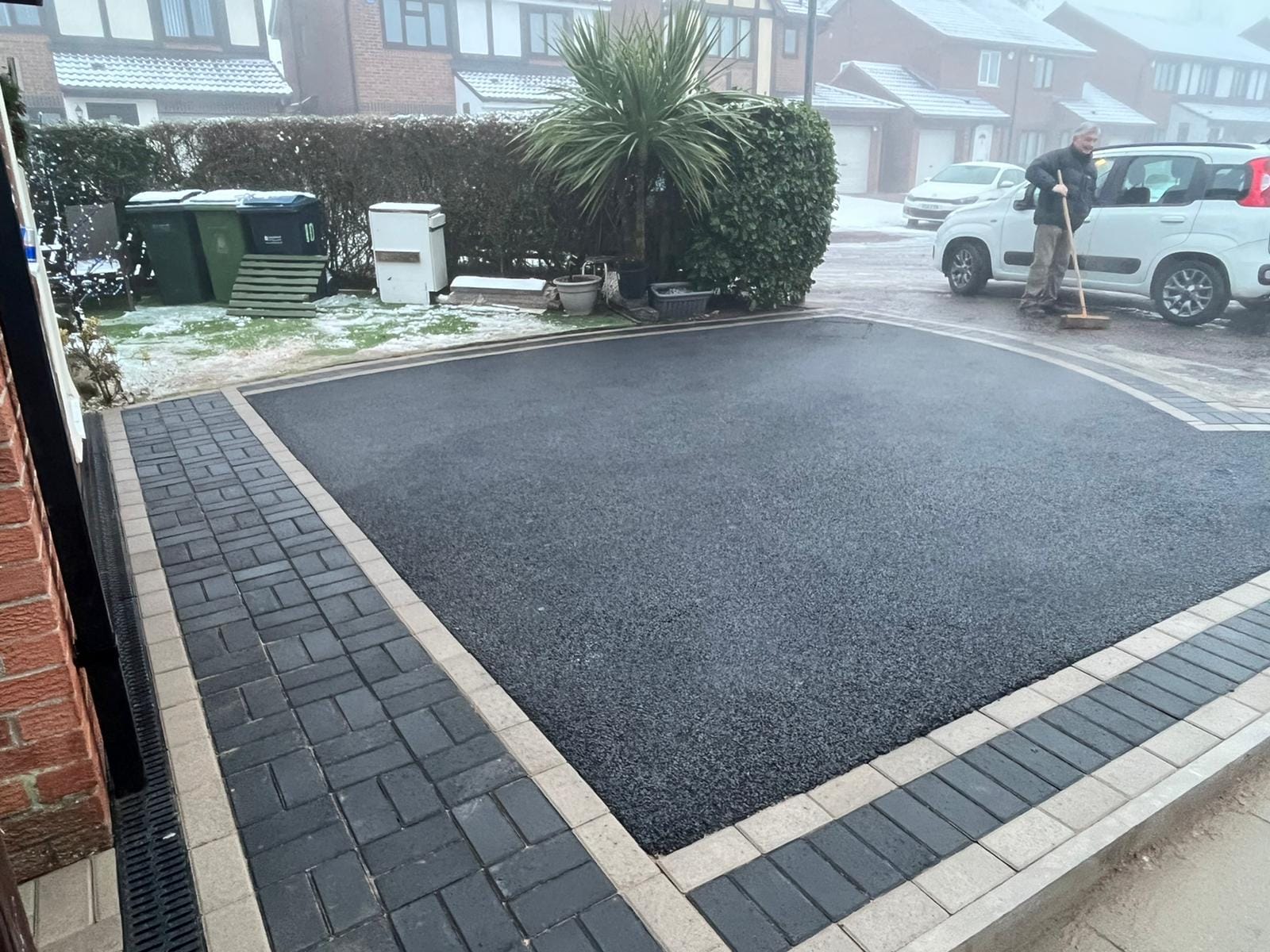 Tarmac driveway with two tone block paved border