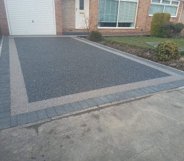 Polaris resin bound driveway with a Titan silver border