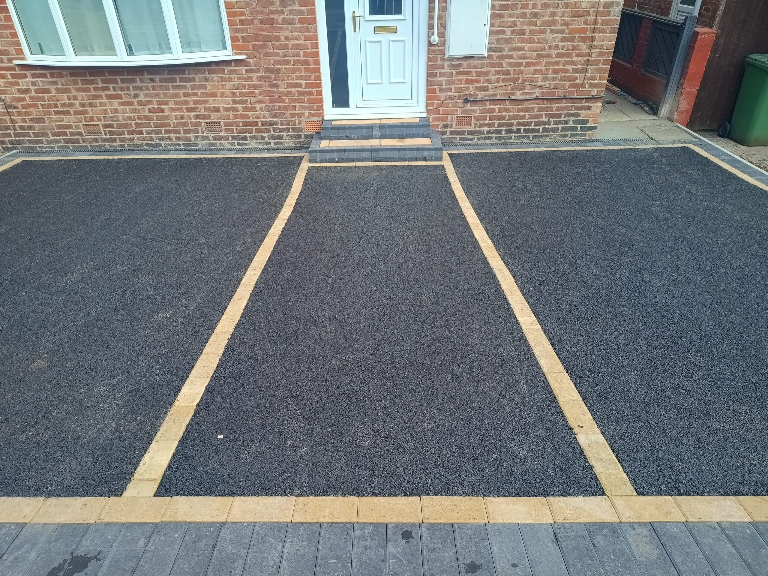 Tarmacadam driveway with Buff border